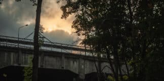 Cloudy Sunset Over Bridge